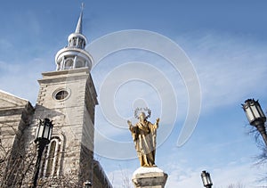 Ste-Rose de Lima catholic church steeple and statue