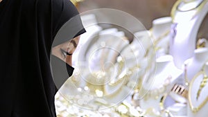 Steadycam - Woman with headscarf shopping at Grand Bazaar, Istanbul, Turkey