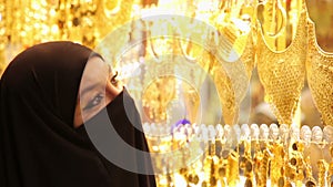 Steadycam - Woman with headscarf shopping at Grand Bazaar, Istanbul, Turkey