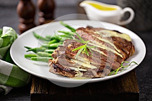 Steak with bearnaise sauce with tarragon photo