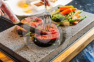 Steak cooked on lava-stone