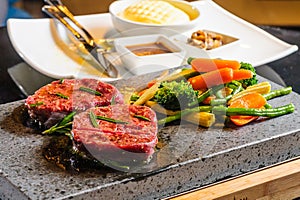 Steak cooked on lava-stone