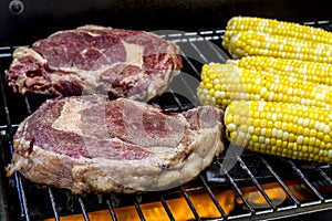 Steak and Corn on Hot Grill