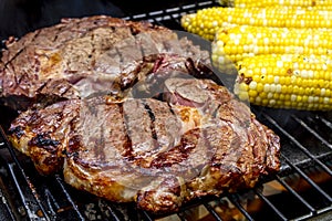 Steak and Corn on Hot Grill