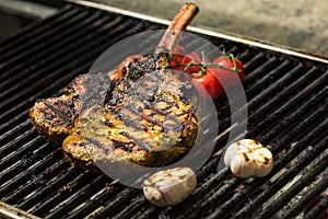 Steak flame broiled on a barbecue