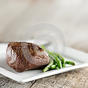 Steak with green beans and copyspace