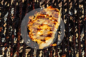 Steak grilled on a charcoal barbeque. Top view of camping tasty barbecue  food concept  food on grill and detail of food on the