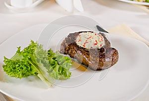 Steak with Herbed Butter and Garnish