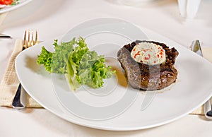 Steak with Herbed Butter and Garnish