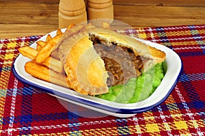 Steak And Kidney Pie And Chips Meal