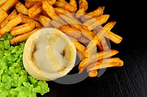 Steak And Kidney Pudding And Chips Meal