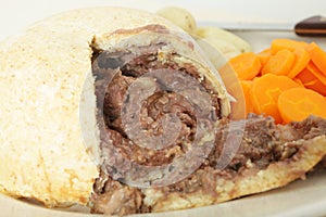 Steak and kidney pudding cut open