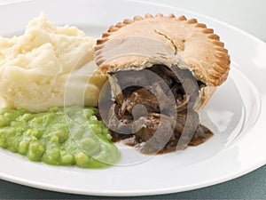 Steak Pie Mash and Mushy Peas