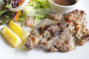 Steak on a plate with fresh vegetables