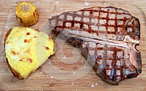 Steak with potato with corn