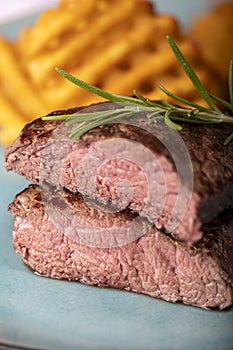 Steak with potato lattices photo