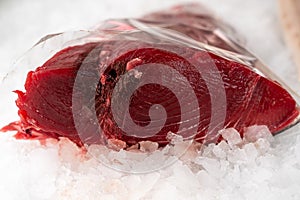 Steak of red tuna on ice