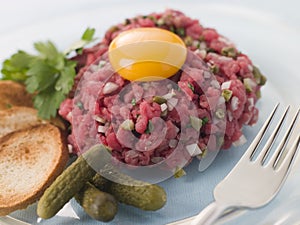 Steak Tartare with Cornichons, Croutons and an Egg