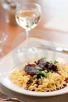 Steak tips and pasta with wine