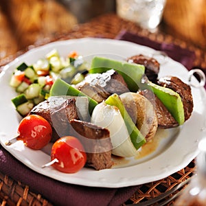 Steak and vegetable shishkabobs with cucumber salad