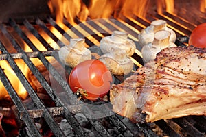 Steak and Vegetables Char-Grilled Over Flaming BBQ Grill