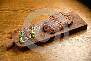 Steak. on a wooden tray