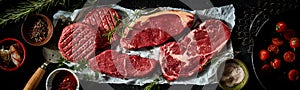 Steaks and burger patties with various seasoning and grilled tomatoes