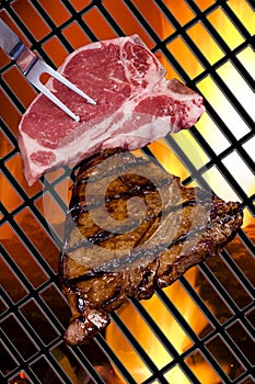 Steaks grilling on barbeque