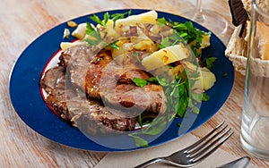 Steaks of pork loin with homestyle boiled potatoes