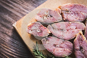 Steaks of red smoked salmon fish and fresh dill