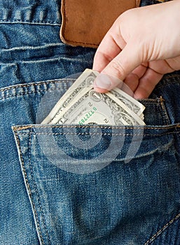 Stealing money from back pocket photo