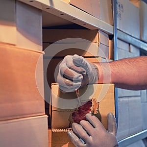 Stealing parcels and damaging the packaging of goods in the warehouse. Stealing and problems with the safety of cargo during