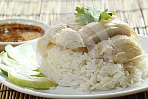 Steam chicken with rice on the plate