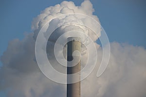 steam from the chimney of coal power plant HemCentrale of Vattenfall in Amsterdam photo