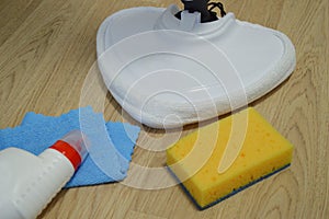 Steam cleaner mop cleaining floor. Cleaning service concept.