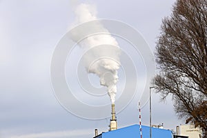 Steam clouds coming from the chimney of the Rotterdam Asphalt Centrale factory