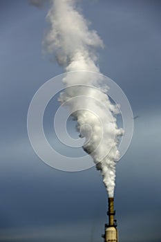 Steam clouds coming from the chimney of the Rotterdam Asphalt Centrale factory