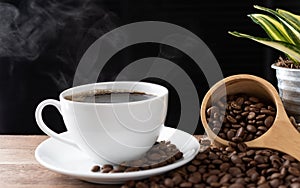 Steam coffee cup with roasted beans and flower pot on wood background in morning sunlight