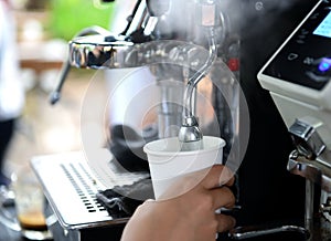 Steam coffee makers with take away cup.