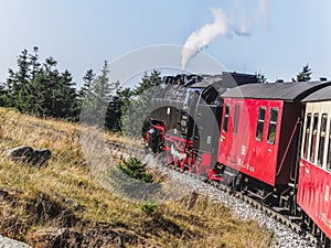 Steam engine train going up to the brocken in Harz Region photo