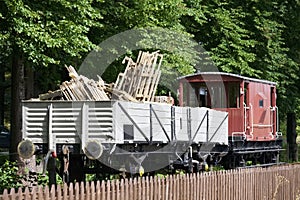 Steam engine victorian train station on old vintage railway in rural countryside uk