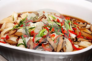 Steam fish with seafood sauce and vegetable