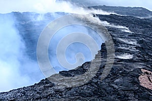 Steam, gases and sulfuric acid rise from Kilauea caldera