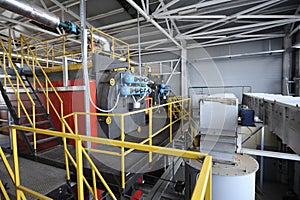 Steam generation vessel working in the production hall of the biggest in Ukraine boiler-house using biofuel wood chips