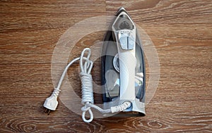 Steam iron for ironing clothes at home