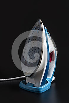 Steam iron isolated on Black background
