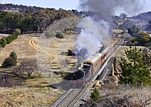Steam locomotive 3016 travelling through countrysi photo