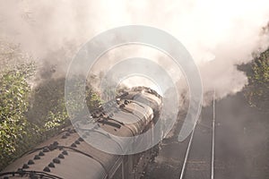 Steam locomotive as it steams past.