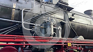 Steam locomotive. German engine locomotive at train station