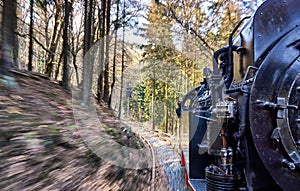 Steam locomotive at high speed in a curve. Dynamics through motion blur